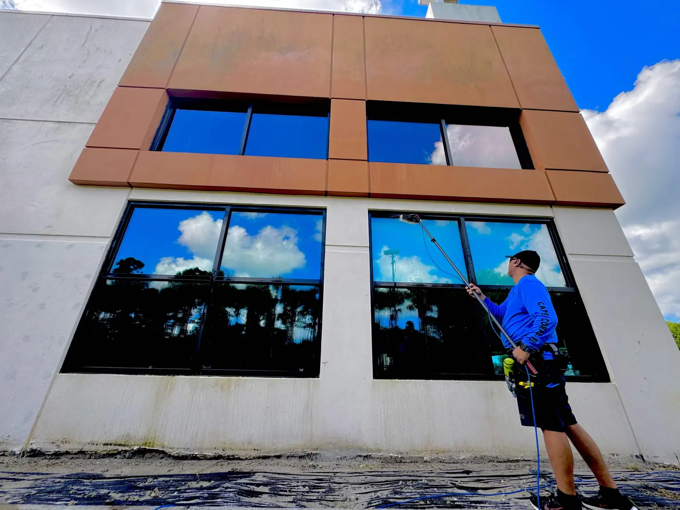 Commercial window cleaning in progress